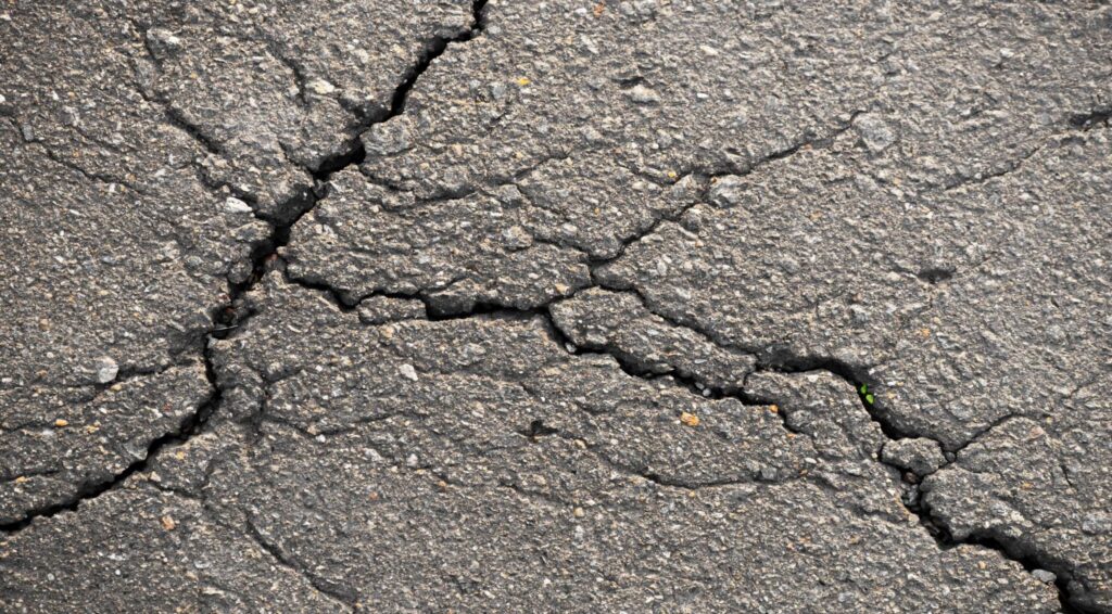 Cracked asphalt.